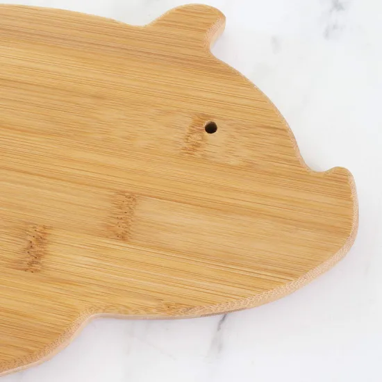 Adorable tabla de cortar de frutas de bambú con forma de cerdo para uso en la cocina