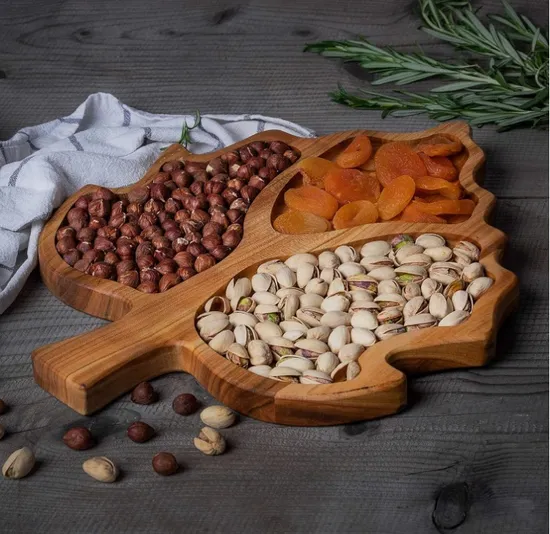 Plato de porción de madera de acacia dividido en forma de hoja para frutas secas/bocadillo