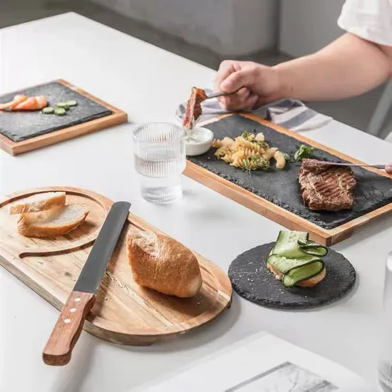Tabla redonda para servir queso de pizarra con asa