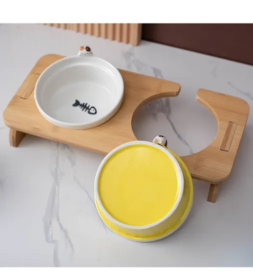 Ningún plato de cerámica del cuenco del animal doméstico del derrame con el cuenco doble de cerámica del animal doméstico del soporte de madera para el gato del perro