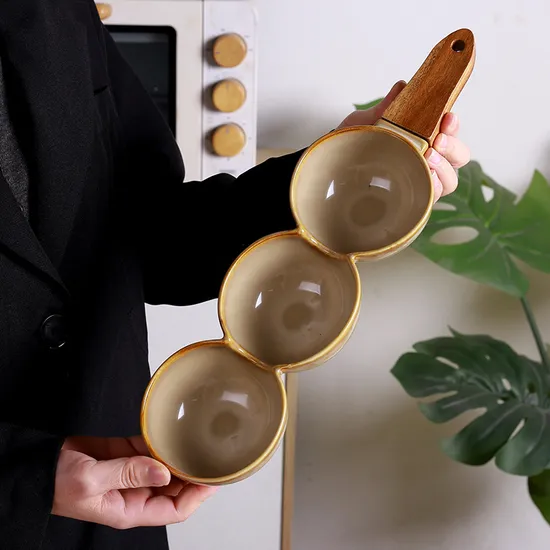 Plato de cerámica creativo para frutos secos y aperitivos de estilo europeo con mango de madera