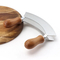 Tabla de cortar redonda de madera con picadora de hierbas Mezzaluna de acero inoxidable de doble hoja