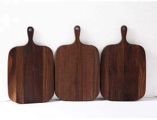 Tablero de charcutería de madera de nogal de venta caliente con mango