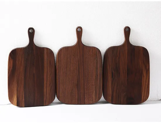 Tablero de charcutería de madera de nogal de venta caliente con mango