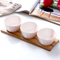 Elegante juego de cuencos de cerámica para servir aperitivos con bandeja de madera para frutas, aperitivos y postres