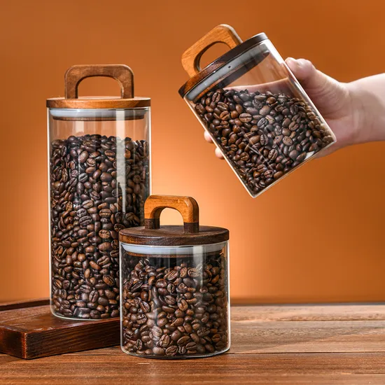 Tarro de cristal de cristal resistente al calor del recipiente de almacenamiento del café con las tapas de madera de bambú de la manija