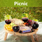 Mesa de picnic al aire libre de bambú de forma ovalada con soporte de vidrio para parque, playa, camping, cama