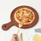 Plato/bandeja redondo personalizado de madera de ébano para servir pizza con asa
