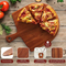 Tabla de cortar de madera para servir pizza con forma de paleta